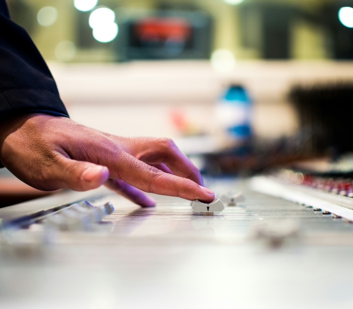 Person using a music mixer
