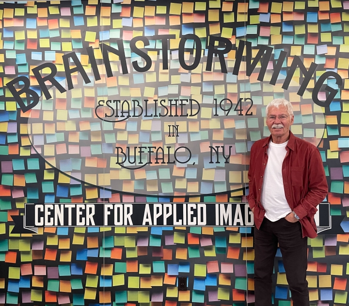 Tim Switalski in front of entrance to Brainstorming Room